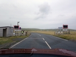 Road crossing runway by Dave Banks
