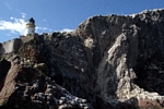 Lighthouse and cliffs, Lothian by Dave Banks