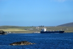 Cargo ship leaving Lerwick, Shetland by Dave Banks
